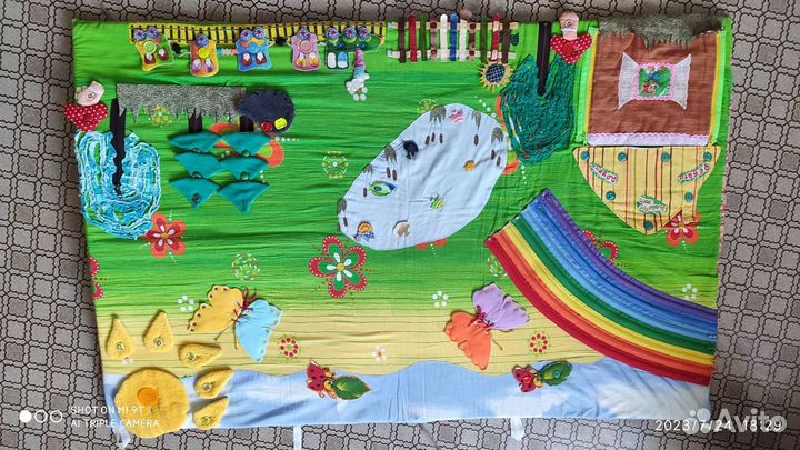 Развивающий коврик попробуй затегни