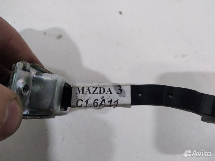 Ограничитель двери задний правый Mazda 3 BL