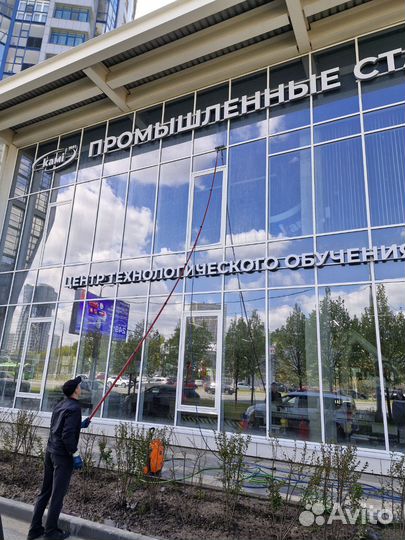 Мойка окон остекления фасада зданий вывесок витрин