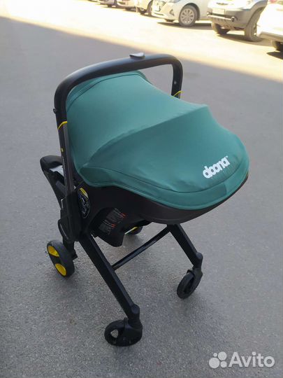 Автолюлька 0+ Doona Plus racing green