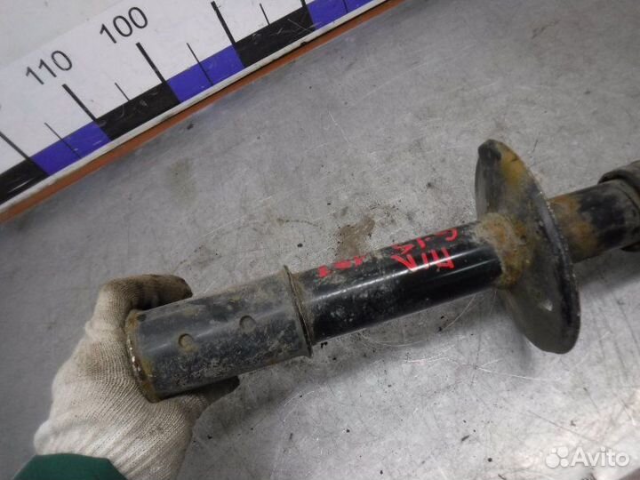 Амортизатор передний левый Nissan Almera G15 K4M