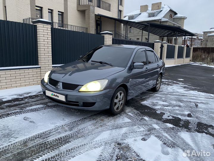 Mitsubishi Lancer 1.6 МТ, 2006, 212 146 км