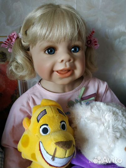 Виниловая кукла