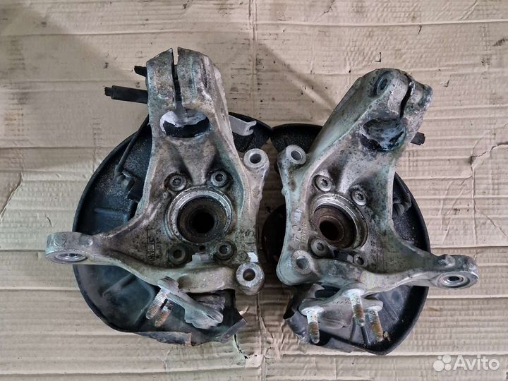 Кулак Поворотный передний Passat B6