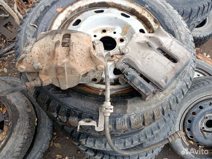 Рено Меган 2 суппорт тормозной передний