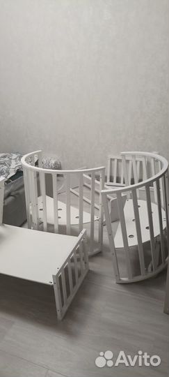 Детская кроватка с поперечным маятником