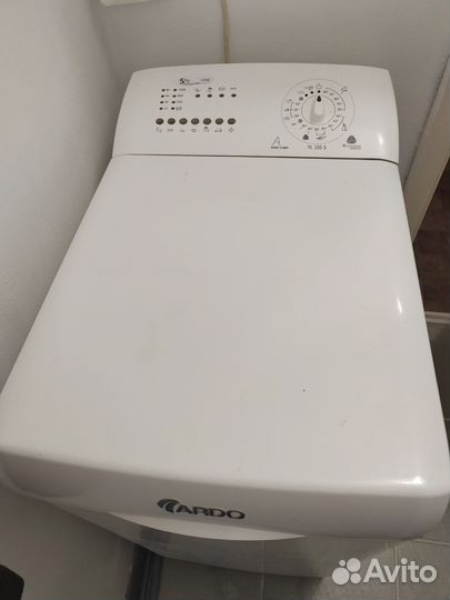 Стиральная машина с вертикальной загрузкой