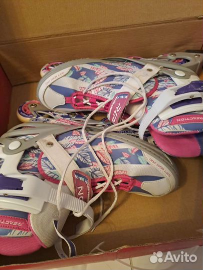 Роликовые коньки