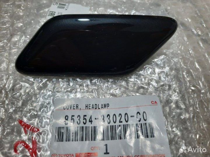 Крышка омывателя фары передняя левая Toyota Camry