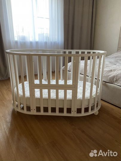 Детская кроватка трансформер с маятником