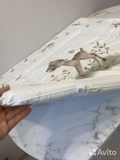 Пеленальный матрас с бортиками