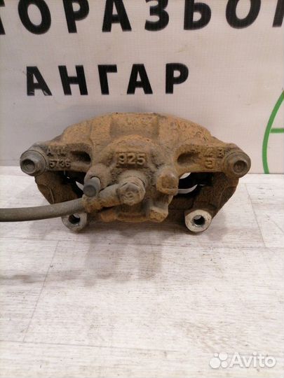 Суппорт передний левый Mitsubishi Lancer 10 CX2A