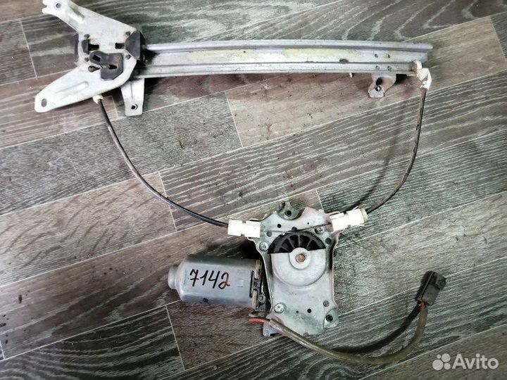 Стеклоподъемник задний левый электро Примера Р11