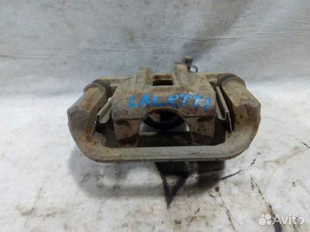 Суппорт передний передний правый Chevrolet Lacetti