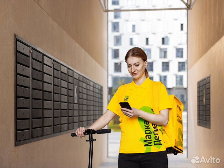 Курьер на велосипеде в Маркет Деливери