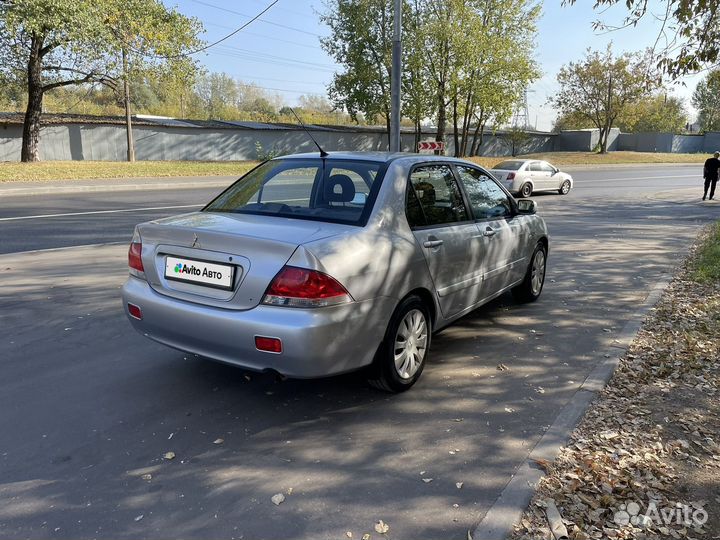 Mitsubishi Lancer 1.6 МТ, 2006, 165 480 км