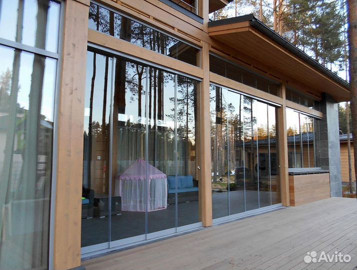 Безрамное раздвижное остекление