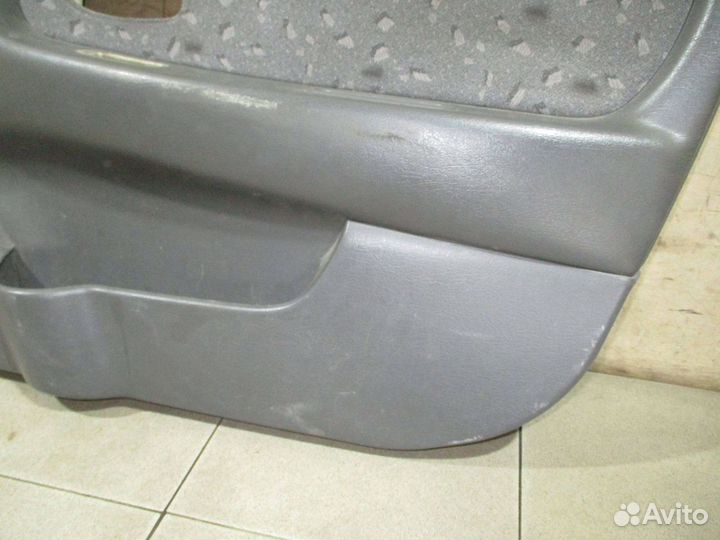 Обшивка двери передней правой Kia Spectra