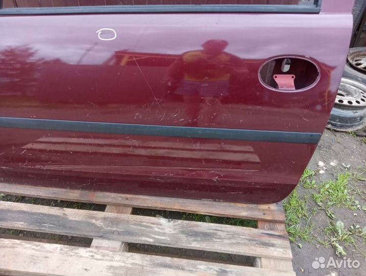 Дверь левая Opel Corsa C
