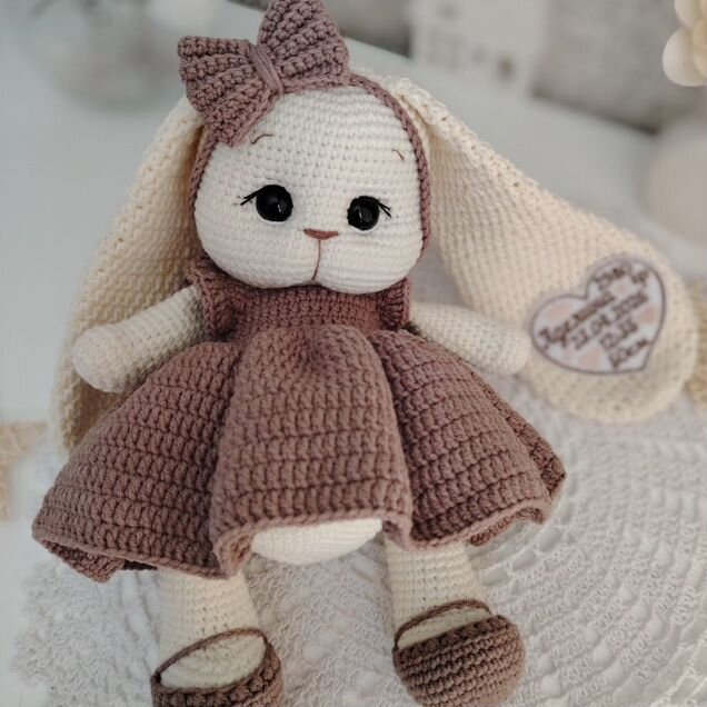 Вязаная игрушка с метрикой