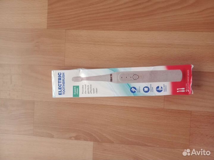 Электрическая зубная щетка новая