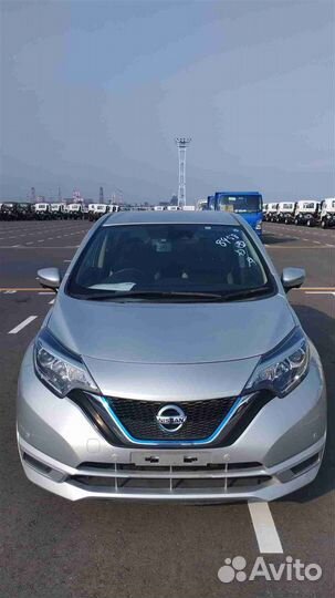 Суппорт тормозной передний левый Nissan Note E