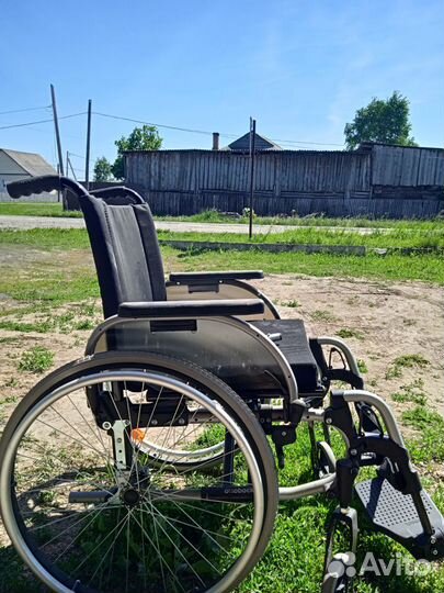 Инвалидная коляска