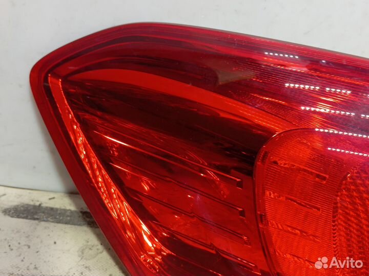 Фонарь задний левый Opel Astra J