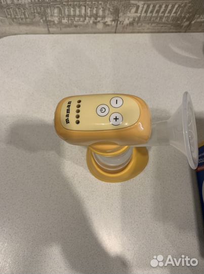 Электрический молокоотсос Maman