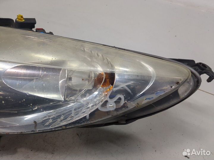 Фара (передняя) левая Peugeot 207