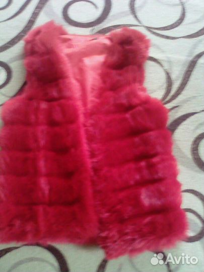 Меховая жилеты