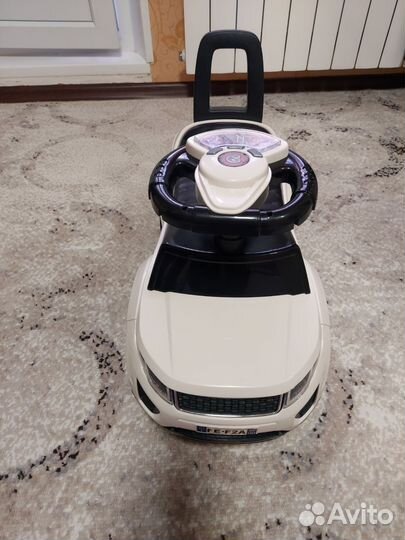 Машинка каталка толокар