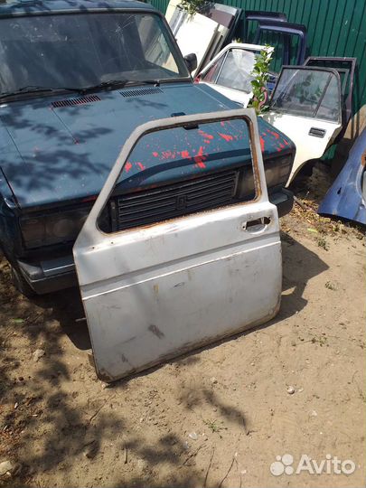 Передние двери на ниву