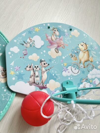 Баскетбольное кольцо и дартс