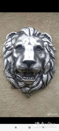 Барельеф голова льва