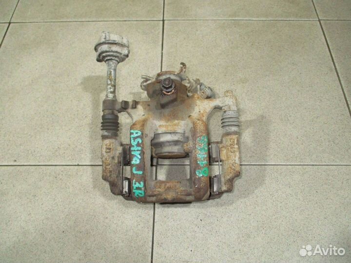 Суппорт задний правый Opel Astra J