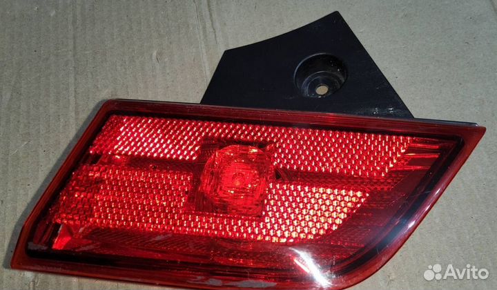 Фонарь задний в бампер левый Mitsubishi Pajero Spo