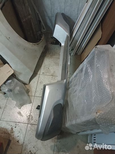 Бампер задний на L200