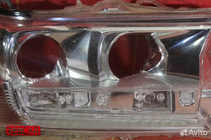 Стекло фары правой с дхо Toyota Land Cruiser 200