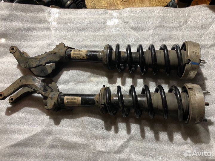 Стойка амортизатора передняя bmw x5 e70