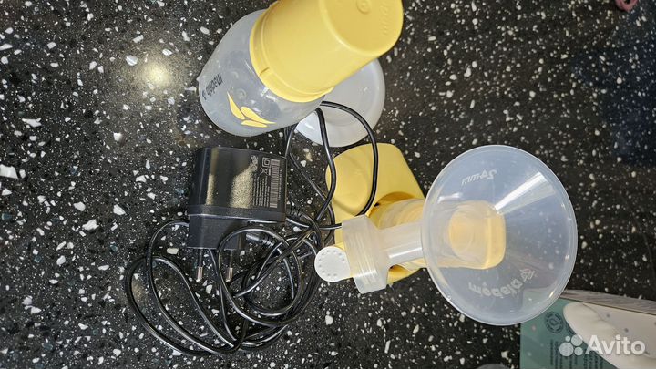 Молокоотсос электрический medela и ручной