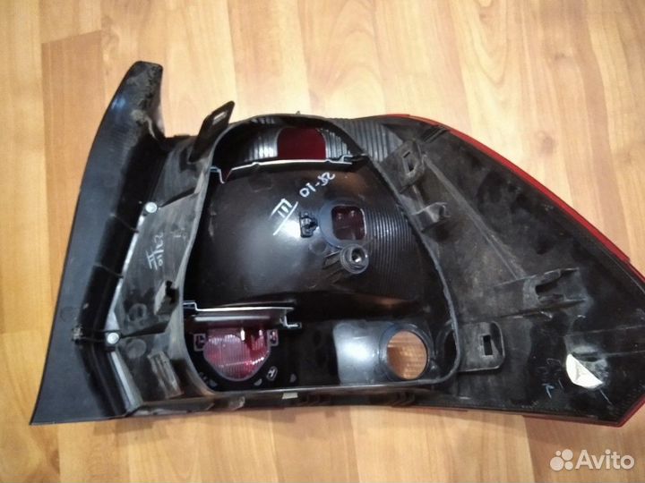 Фонарь задний левый Volkswagen Polo Sed