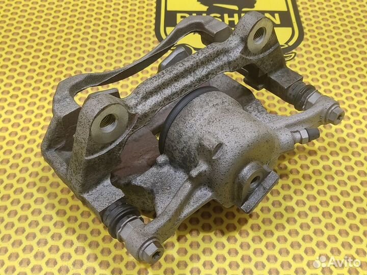 Суппорт тормозной передний левый Volkswagen Jetta