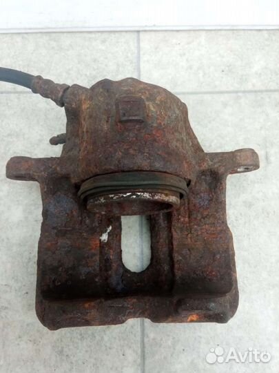 Суппорт тормозной передний левый Renault Espace 3