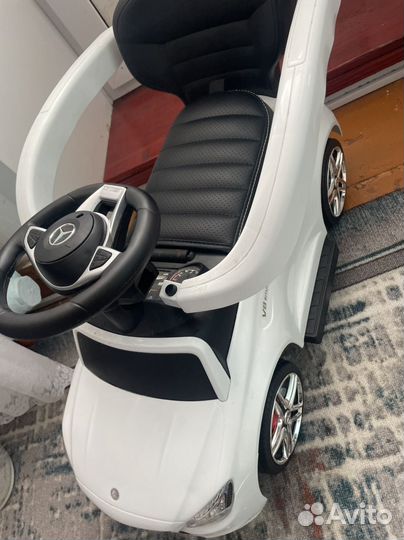 Машинка каталка с ручкой