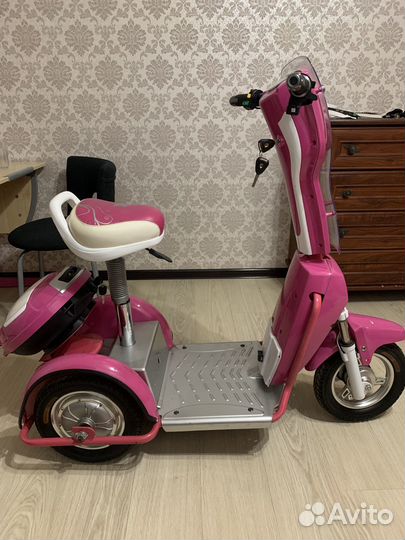 Электроскутер трицикл