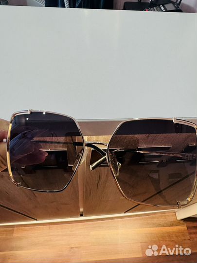 Солнцезащитные очки женские брендовые