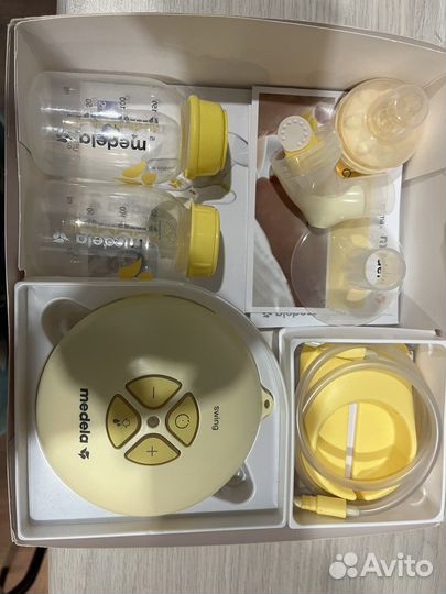 Молокоотсос medela электрический