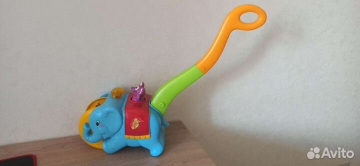 Музыкальная каталка слон циркач kiddeland