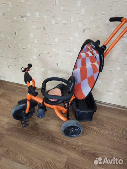 Трехколесный велосипед с ручкой